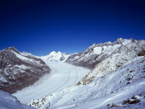 Switzerland, Valais, Aletsch Glacier, Grosser Aletschgletscher. View from Eggishorn towards peaks of from left to right Dreieckhorn Jungfrau Monch Trugberg Eiger and Wannenhorn.