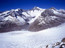 Switzerland, Valais, Aletsch Glacier, Grosser Aletschgletscher. Crevasse area below Aletschhorn 4195 metres centre and Dreieckhorn 3811 metres right. Mittel aletschgletscher Tonge centre.