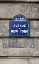 France, Ile de France, Paris, Typical Parisian street sign on old building wall with the Avenue de New York street name written on it.