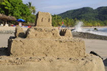 Mexico, Zihuatanejo, Playa la Ropa, sandcastle on the beach.