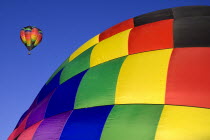 USA, New Mexico, Albuquerque, Annual balloon fiesta, Colourful hot air balloons in flight.