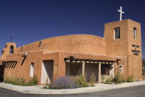 USA, New Mexico, Taos, Our Lady of Guadalupe aprish Church built in the typical Adobe style architecture.