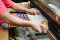 Mexico, Oaxaca, Carpet weaving at La Mano Magica by Tomas Mendoza.