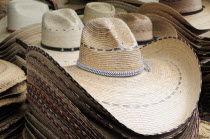 Mexican, Michoacan, Patzcuaro, Hats for sale in the market.