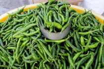 Mexico, Veracruz, Papantla, Green chillies for sale in the market.