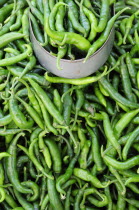 Mexico, Veracruz, Papantla, Green chililes for sale in the market.