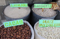 Mexico, Oaxaca, Pulses and maize for sale in the market.