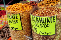 Mexico, Oaxaca, Peanuts for sale on market stall.