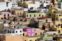 Mexico, Bajio, Zacatecas, Looking across flat rooftops of colourful houses from viewpoint at Cerro del Grillo.