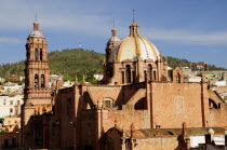 Mexico, Bajio, Zacatecas, The cathedral, exterior with domed roof and bell towers.