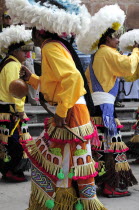 Mexico, Bajio, Zacatecas, Indigenous dance group performing in Plaza Hidalgo.