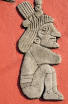 Mexico, Veracruz, Papantla, Detail of relief carving of Totonac figures on the Mural Cultural Totonaca in the Zocalo.