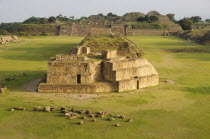 Mexico, Oaxaca, Monte Alban archaeological site, Ruins of Monticulo J and Edifio I,H and G buildings in the central plaza.