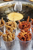 Mexico, Michoacan, Patzcuaro, Fried fish snacks for sale in market.