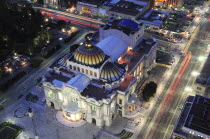 Mexico, Federal District, Mexico City, View over Palacio Bellas Artes at night from Torre Latinoamericana.