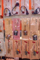 Japan, Tokyo, Ginza,display of keyrings and necklaces for sale.