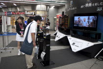 Japan, Tokyo, Sony 3D televisions being demonstrated in shopping mall.