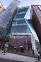 Japan, Tokyo, Harajuku, Audi Forum building on Meiji-dori Avenue, unusual glass frontedarchitecture.