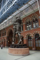 England, London, St Pancras railway station on Euston Road, The Meeting Place statue by Paul Day.