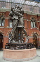 England, London, St Pancras railway station on Euston Road, The Meeting Place statue by Paul Day.