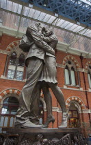 England, London, St Pancras railway station on Euston Road, The Meeting Place statue by Paul Day.