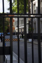 England, London, Westminster, Whitehall, Downing Street, Security gates and armed police guards,