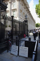 England, London, Westminster, Whitehall, Downing Street, Security gates and armed police guards,