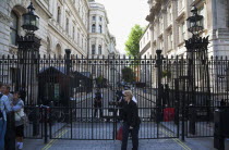 England, London, Westminster, Whitehall, Downing Street, Security gates and armed police guards,