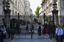 England, London, Westminster, Whitehall, Downing Street, Security gates and armed police guards,