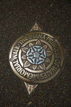 England, London, Westminster, placque in the ground marking the Princess Diana memorial walk through St James Park.