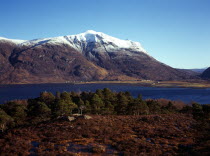 Scotland, Highlands, Torridon, View across Loch Torridon towards south face of Liathach, 1055 metres at highest point with snow topped summit.