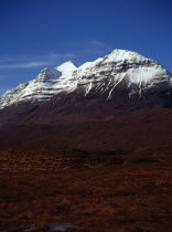Scotland, Highlands, Torridon, View from Glen Torridon towards south east face of Liathach, 1055 metres at highest point with snow topped summit.