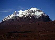 Scotland, Highlands, Torridon, View from Glen Torridon towards south east face of Liathach, 1055 metres at highest point with snow topped summit.