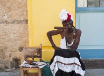 Cuba, Havana, Old Town, Cigar Lady, charges tourists $1 for a picture.