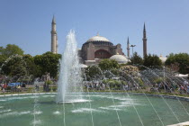 Turkey, Istanbul, Sultanahmet, Ayasofya Muzesi, Hagia Sofia Museum with fountain in the foreground.