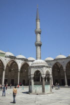 Turkey, Istanbul, Sultanahmet Camii, Blue Mosque, courtyard with minaret.