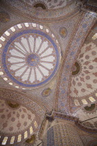 Turkey, Istanbul, Sultanahmet Camii, Blue Mosque interior, detail of the domed ceiling.