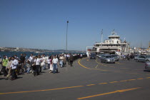 Turkey, Istanbul, Sirkeci ferry terminal with cars and passengers disembarking.