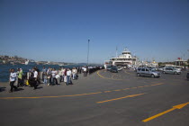 Turkey, Istanbul, Sirkeci ferry terminal with cars and passengers disembarking.