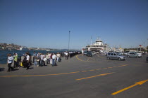 Turkey, Istanbul, Sirkeci ferry terminal with cars and passengers disembarking.