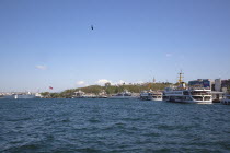 Turkey, Istanbul, Galata Bridge, farries on Sirkeci quayside with fishermans line weight visible.