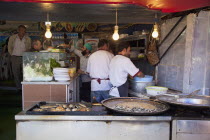 Turkey, Istanbul, Karakoy, Galata fish market, stall selling freshly fried fish snacks.