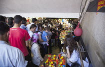 Turkey, Istanbul, Eminonu, busy subway with stall selling childrens toys.