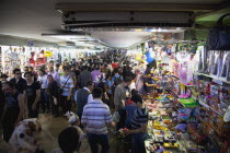 Turkey, Istanbul, Eminonu, busy subway with stall selling childrens toys.