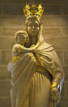 England, West Sussex, Shoreham-by-Sea, Lancing College Chapel interior, statue of the Virgin Mary holding the Baby Jesus.