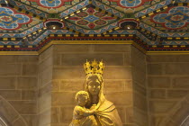 England, West Sussex, Shoreham-by-Sea, Lancing College Chapel interior, statue of the Virgin Mary holding the Baby Jesus.