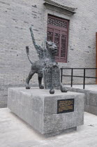 China Jiangsu Yangzhou, Bronze lion sculpture outside the Marco Polo Museum. The sculpture is a copy of the lion statue standing in a square in Venice the hometown of Marco Polo. Marco Polo served as...
