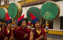 India, Sikkim, Buddhist Monks playing drums in a Losar ceremony.