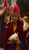 India, Sikkim, Buddhist monk in a Losar ceremonial procession.