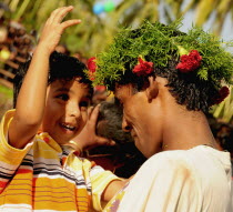 India, Goa, Siolim, San Jao Festival celebrated with flower head wreaths.